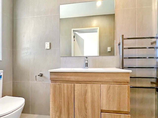 Brand New 4-Bedroom House with 3.5 Bathrooms in Totara Vale photo